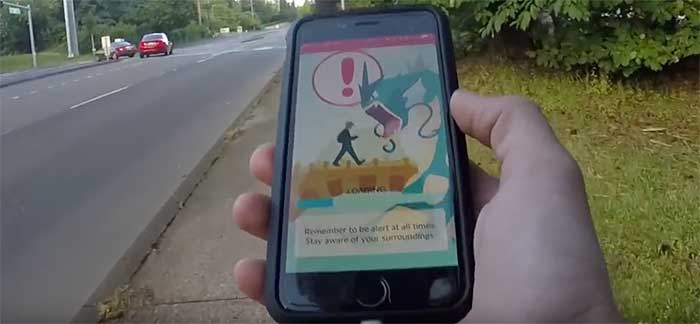 Pokemon Go reminds users to pay attention. Is that warning enough? (Source: YouTube)