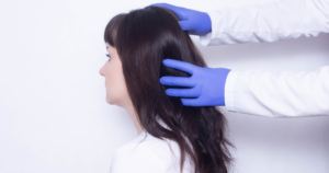 A doctor examining a patient after a brain injury