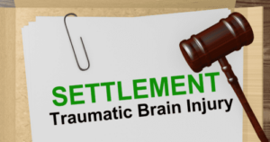tbi settlement 500x263 1 1