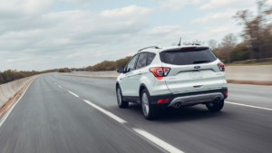 Samantha Parian an image of a white Ford Escape in the highway 6750f394 40d4 4935 a427 ff9f068aeec8