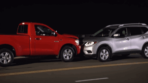 Red truck and silver SUV collision.