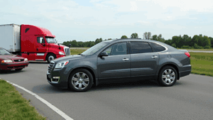 Gray SUV, red sedan, semi-truck collision.