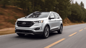 Silver Ford Edge SUV driving on road
