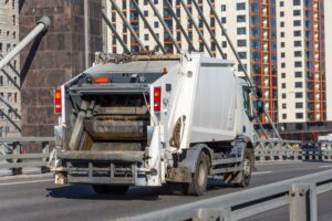 Garbage truck on urban road