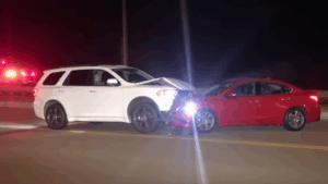 White SUV crashed into red sedan