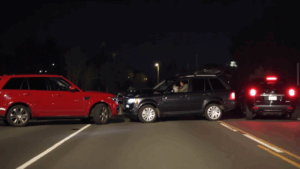 Three cars involved in nighttime collision.