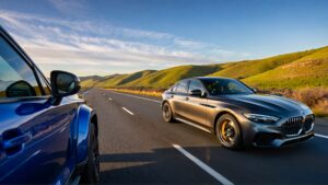 Sedan and SUV on a highway