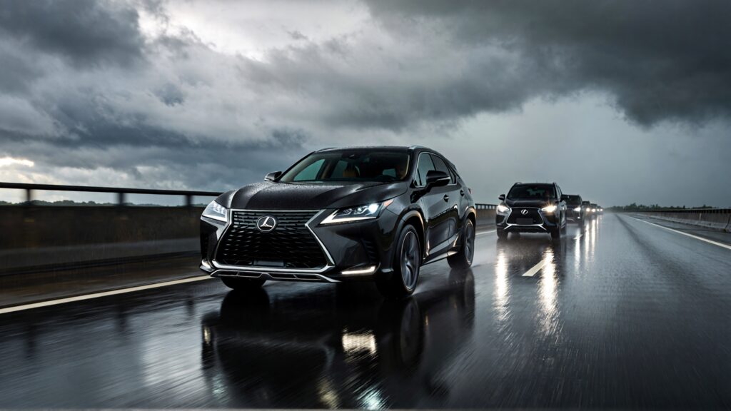 Juris digital a black Lexus SUV and a black SUV on the road 30970196 20a7 48a0 8d2d 1ead66a3fa9a