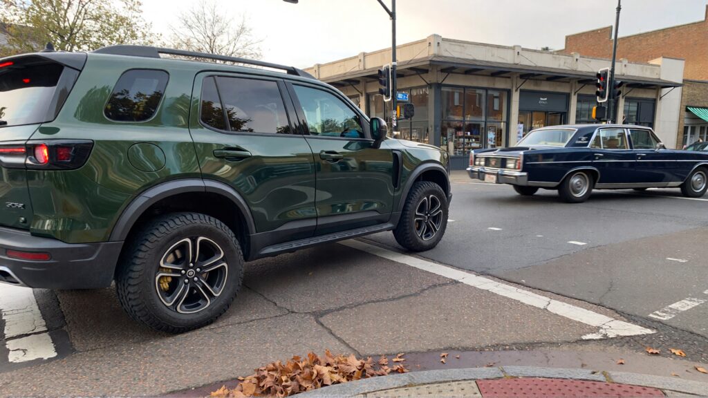 Juris digital an SUV and station wagon on the street intersection 544c7900 d111 41a2 8d84 1815643ab286 1