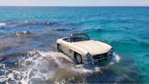 Car driving on water surface.