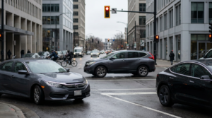 Cars at an urban intersection.