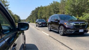 Cars driving on a highway.