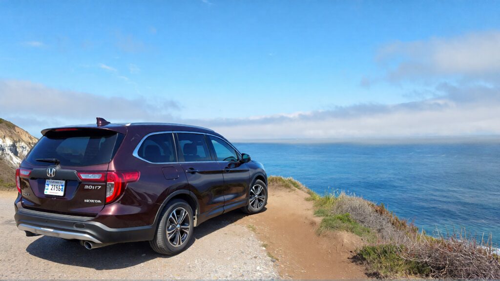 Juris digital a black 2017 Honda Pilot on a cliff and below the sea eaad9690 58db 4db5 ad16 c1d16058511f