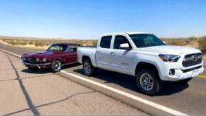 Classic and modern cars on road
