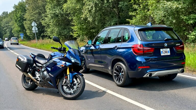 Juris digital a BMW SUV and a motorcycle on the road 9810c135 41c8 49fc 8272 083b84191a9b