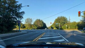 Clear intersection with traffic lights.