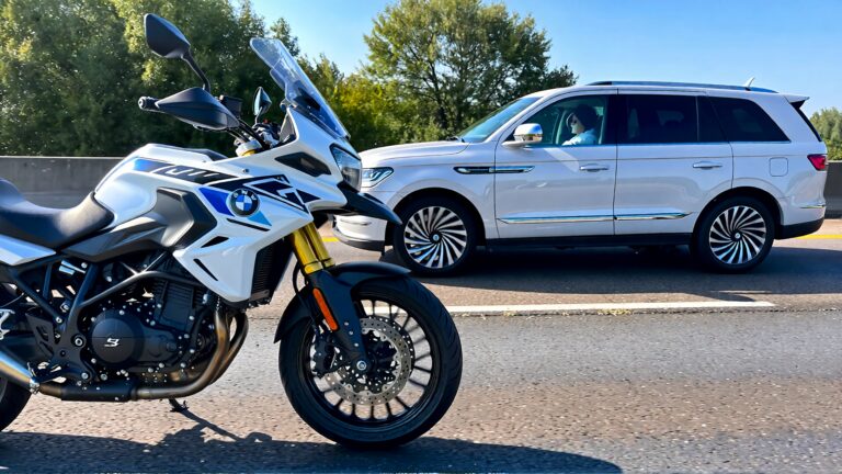 Juris digital a white 2009 BMW F650GS motorcycle and a white 2022 Lincoln Navig ddb24bfb fcb4 47fd 9bcf 55c53e09dde0