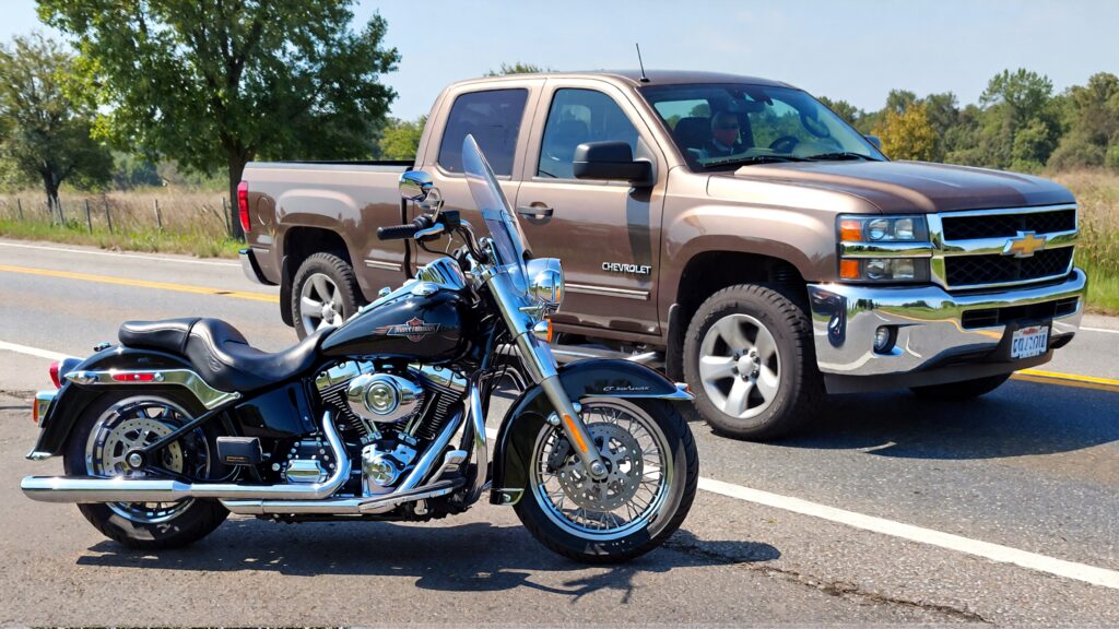 Samantha parian a Harley Davidson motorcycle and a Chevrolet Silverado pickup tru d94ffeac da4e 4b99 83d4 0153ceefacd6