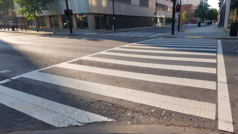 Empty crosswalk on a sunny day.
