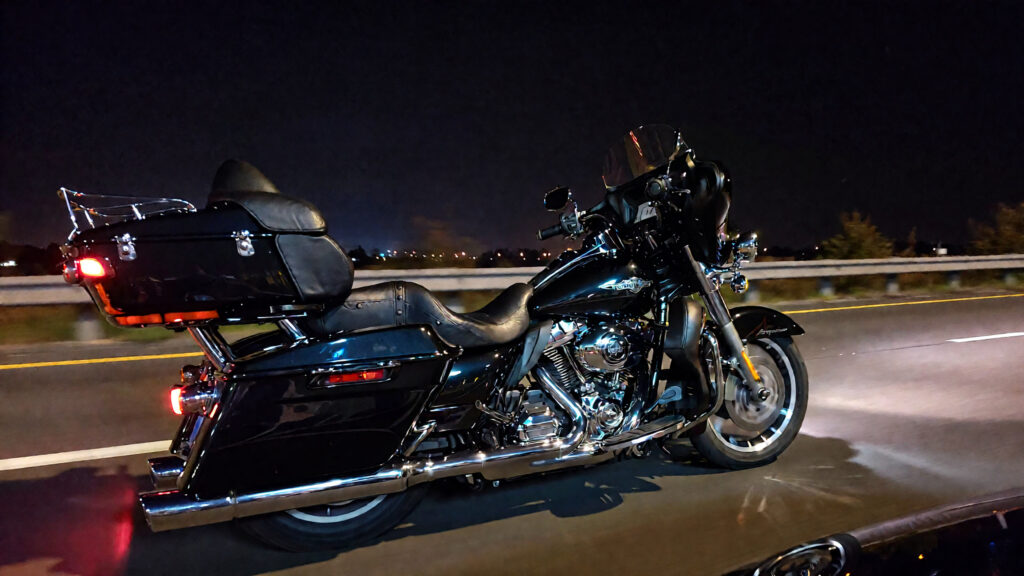 Samantha parian a 2015 black Harley Davidson Road Glide motorcycle on the highway bbe48ec4 b077 4206 810a 82237c333583