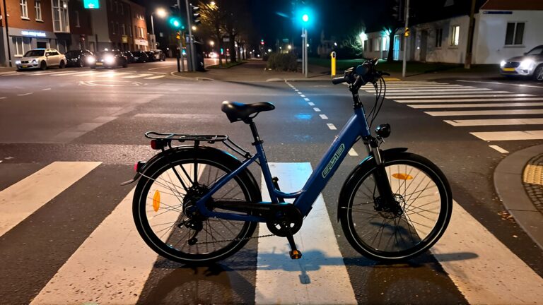 Electric bike at night intersection.