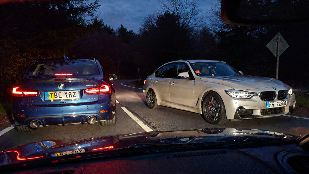 Samantha parian a BMW and an Infiniti on the road at night a54d318c 7848 4d49 983d c208f01c2798
